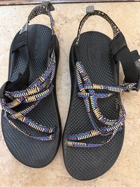 Chaco Girls Black Sandals with Blue, Yellow & Red Patterned Straps